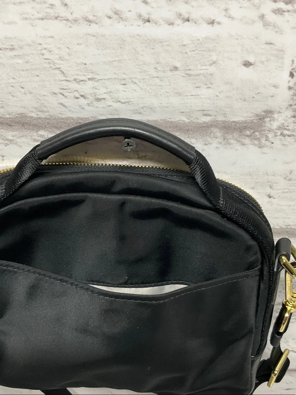 Tumi Black Nylon Crossbody with Gold Hardware Accents